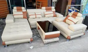 L-Shaped Sofa With Single Seater Chair and Table