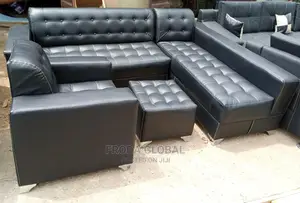 L-Shaped Sofa With a Single Seater Chair and Ottoman