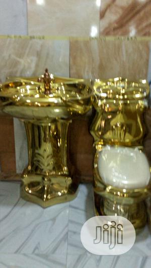 W. C. Set Golden