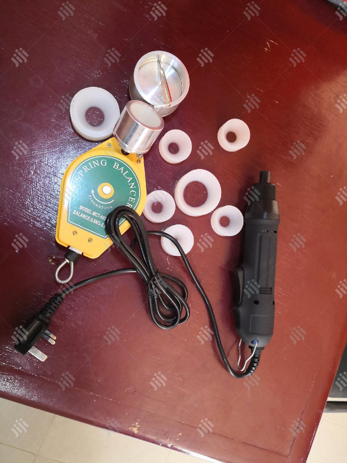 Electric Hand Capping Machine.