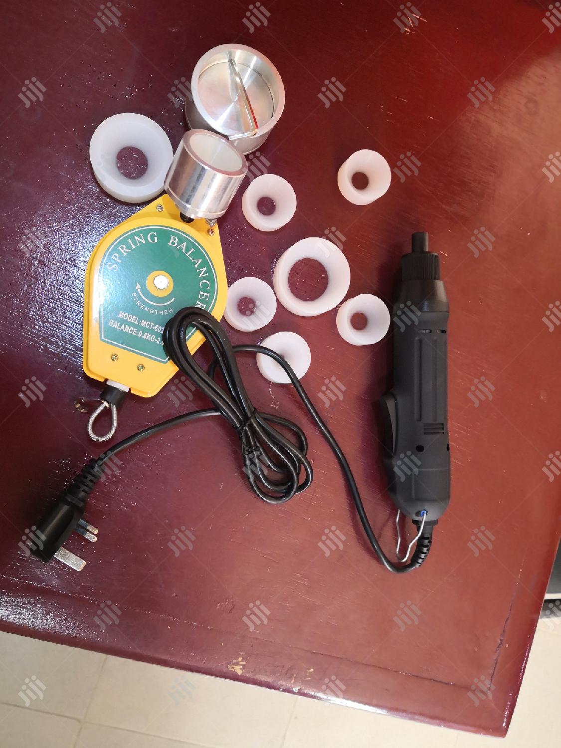 Electric Hand Capping Machine.