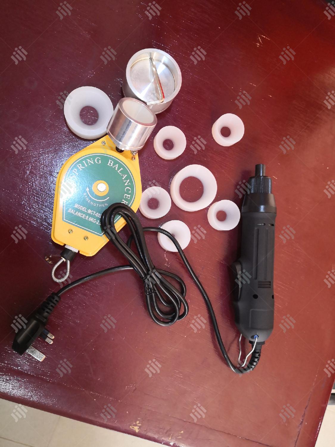 Electric Hand Capping Machine.