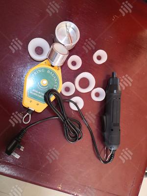 Electric Hand Capping Machine.