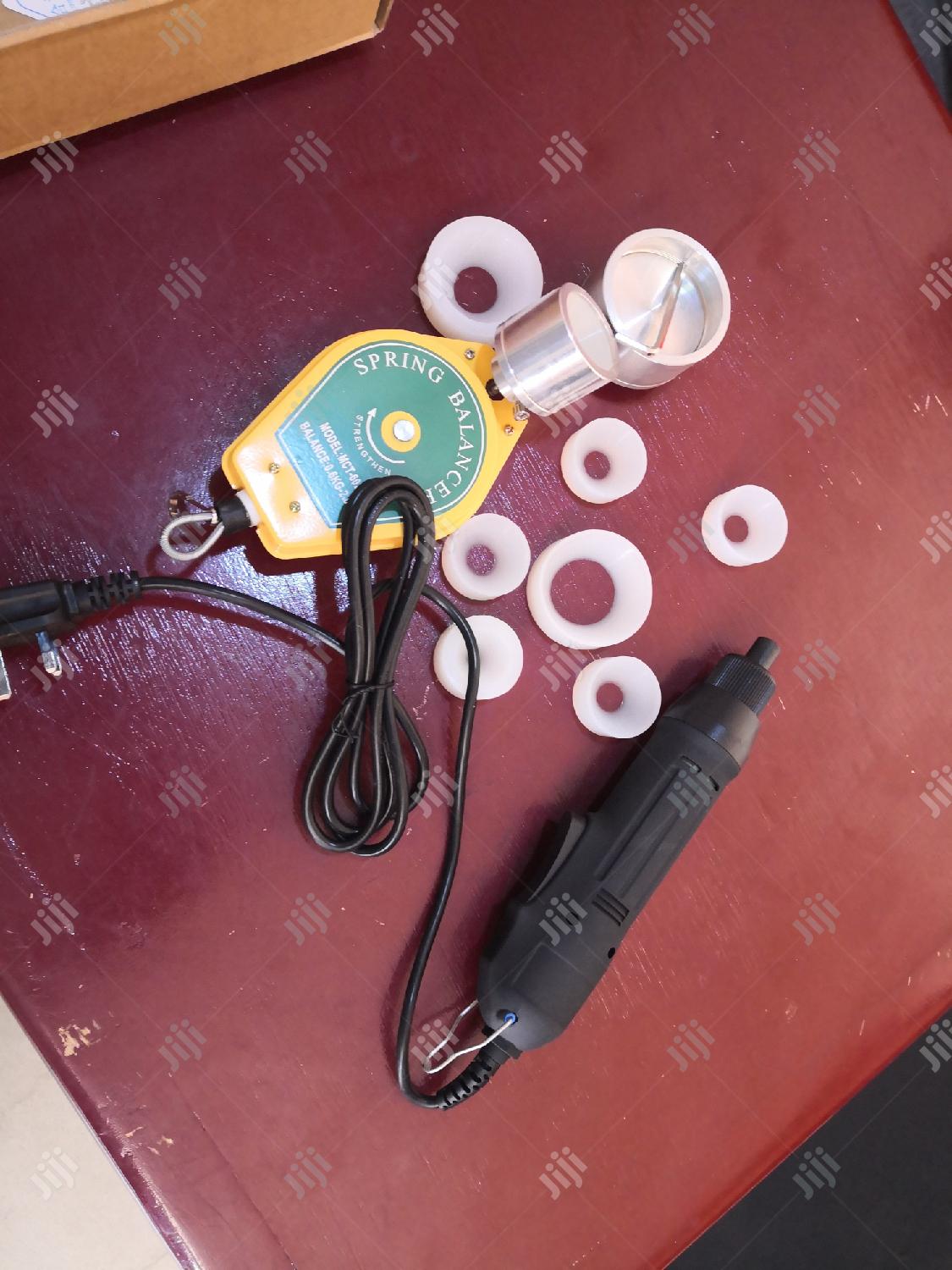 Electric Hand Capping Machine.