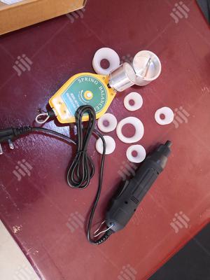 Electric Hand Capping Machine.