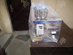 Semi Auto Granule Filling Machine.