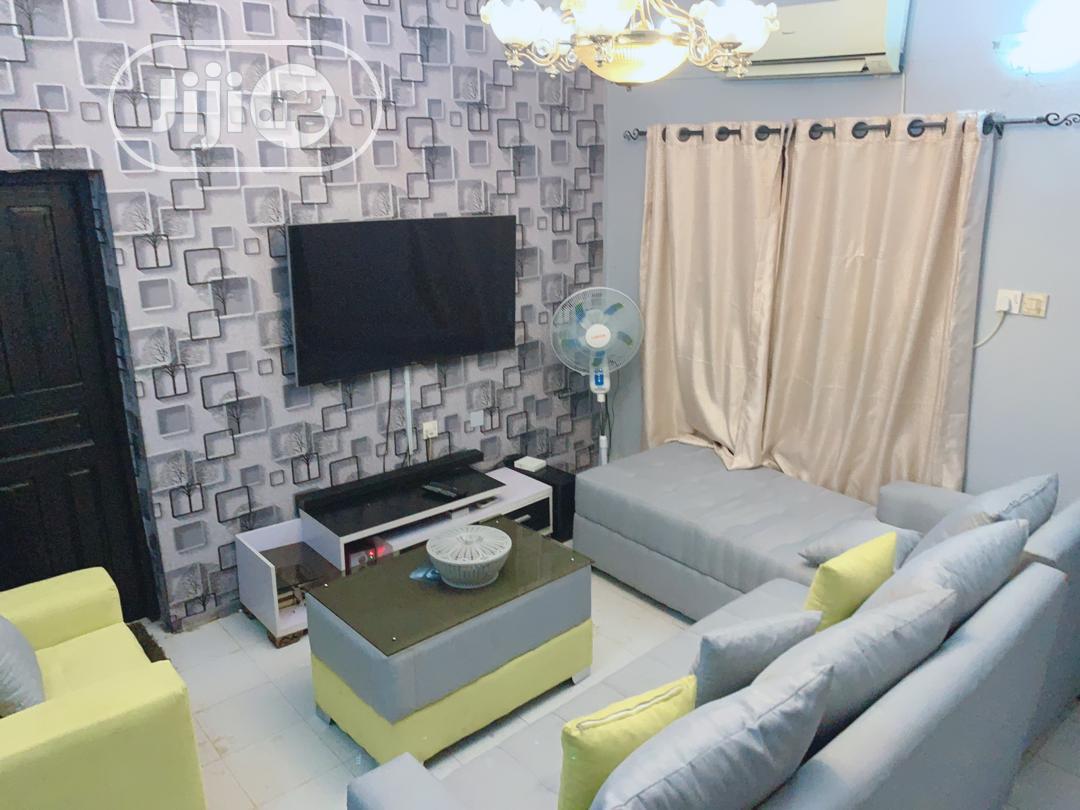 Sectional Sofa, Single Seater Ottoman Table