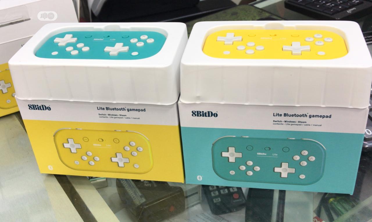 Nintendo Switch Lite- Yellow, Torquitose & Grey