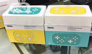 Nintendo Switch Lite- Yellow, Torquitose & Grey