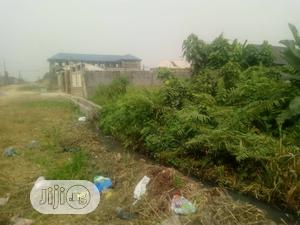 A Plot of Land at Abojo GRA 930SQM With C of O for Sale