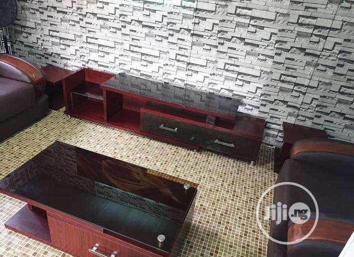A Tv Stand and Table.