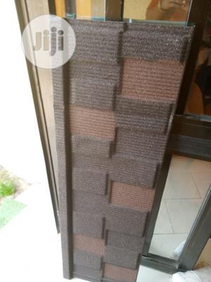 Tiger Shingle Stone Voated Roof Material From Sylverkings.