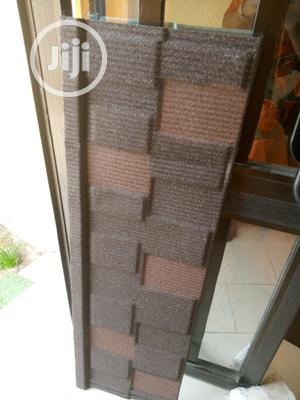 Tiger Shingle Stone Voated Roof Material From Sylverkings.