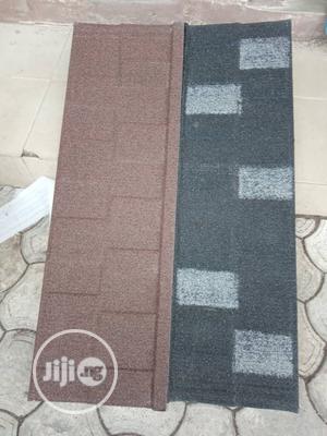 Pure SKG Stone Coated Roofing Sheet.