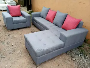 L-Shaped Sofa With a Single Seater Chair. Fabric Couch
