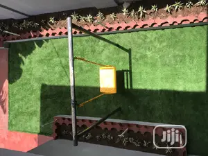 Portable Simple Garden Transformed With Green Grass Rugs Outdoor