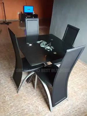 Quality 4 Seater Tempered Glass Top Dining Table.