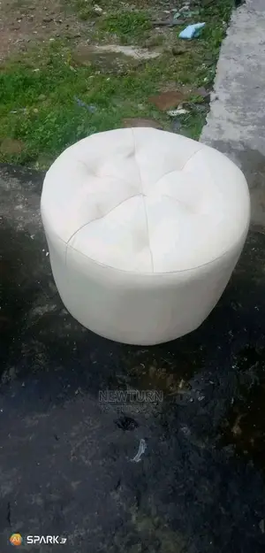 Solid Leather Mini Puff Chair.