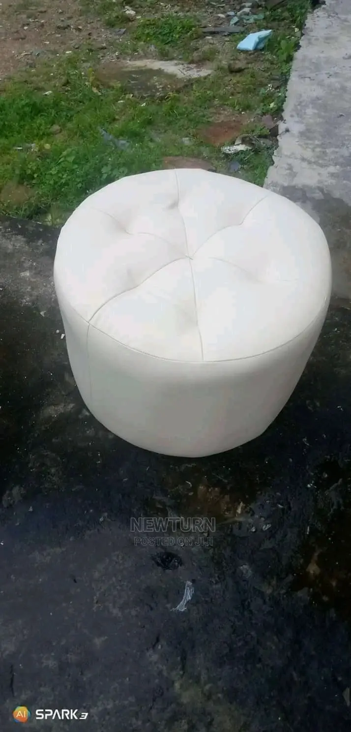 Solid Leather Mini Puff Chair.