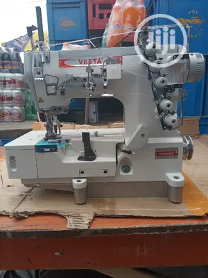 Vesta Taping Machine