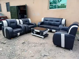 Set of 7seaters Sofa Chairs and Centre Table. Leather Couch