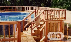 Photo - Pressure Treated Wood Above Ground Pool Deck Construction