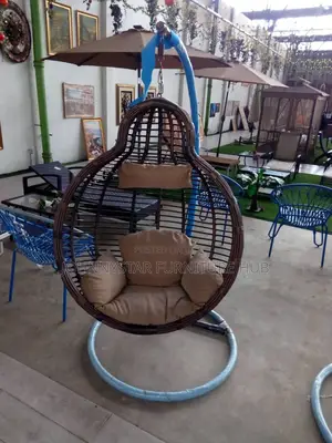 Luxury Indoor/Outdoor Rattan Made Hanging Swing Chair.