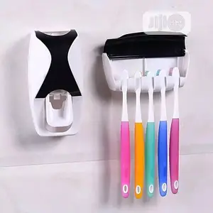 Photo - Tooth Paste Dispenser and Tooth Brush Holders