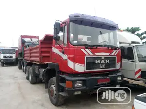 Photo - Man DIESEL Tipper