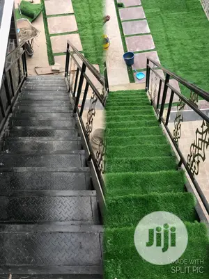 Design Your Iron Made Staircase With Grass Rugs