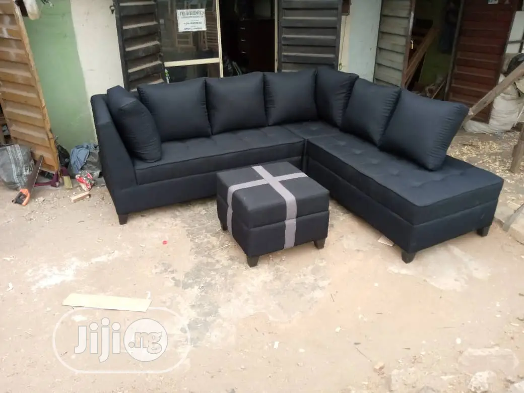 Black L- Shaped Sofa With Center Table
