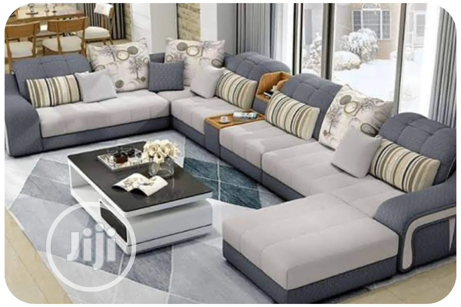 Classic U-Shaped Sofa With Throw Pillows and Center Table