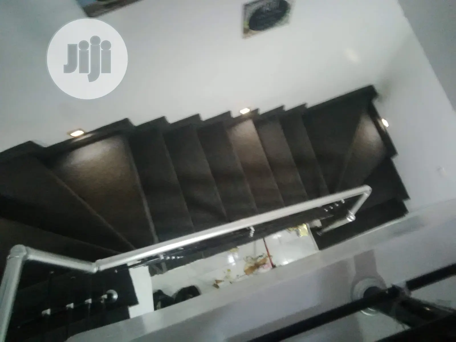 Redefine Your Staircase With Plain Grey Rugs