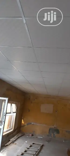 Suspended Ceiling/Wooden Floor.
