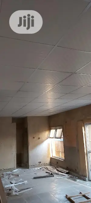 Suspended Ceiling/Wooden Floor.