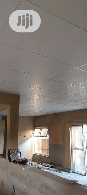 Suspended Ceiling/Wooden Floor.