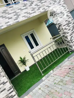 Sit Out Extension Beautify With Green Grass Rugs