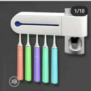 Toothbrush Sterilizer/Holder and Toothpaste Dispenser