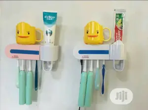 Toothbrush Sterilizer/Holder and Toothpaste Dispenser