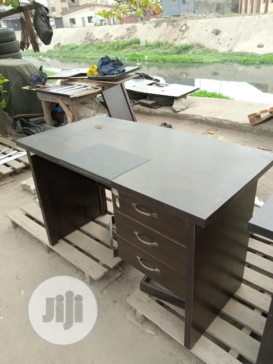 A Four Feet Table With Pad