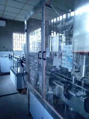 Fully Automated Washing, Filling, and Capping Bottle Line.