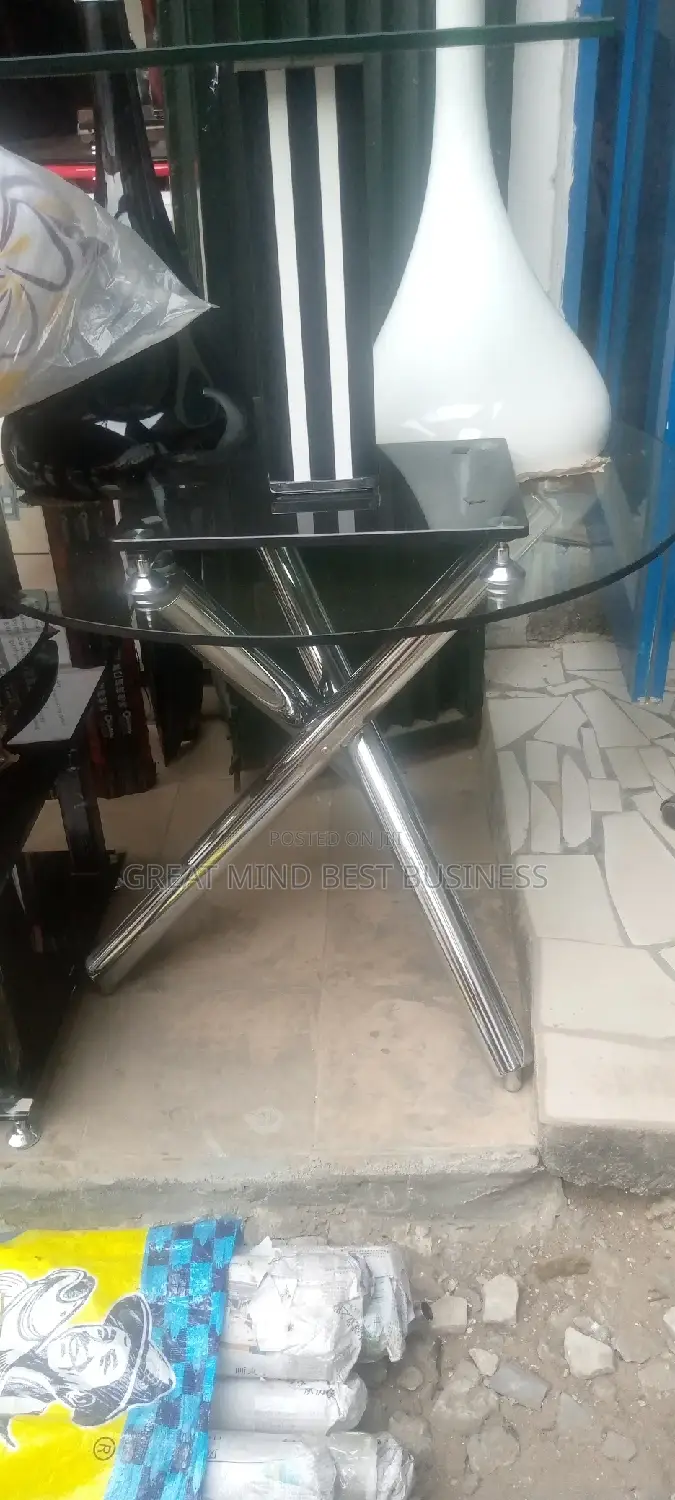 Crossing Leg Glass Table