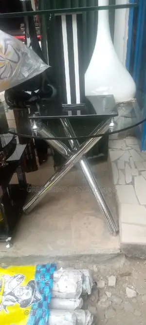 Crossing Leg Glass Table