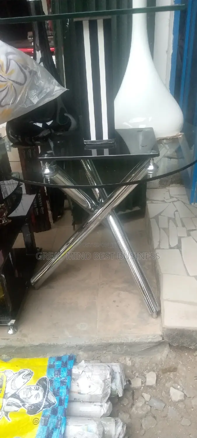 Crossing Leg Glass Table