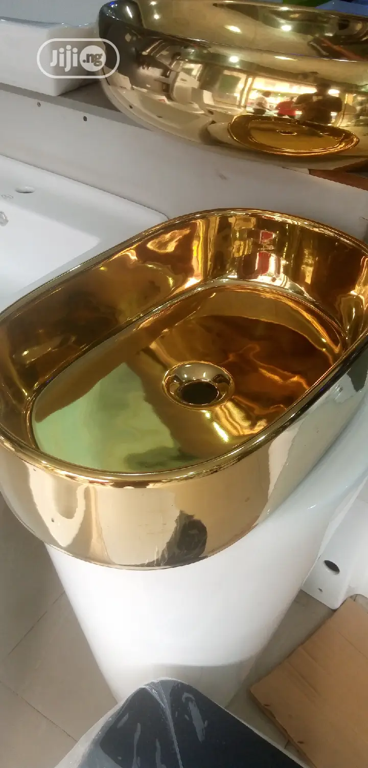 Gold Marble Top Basins.