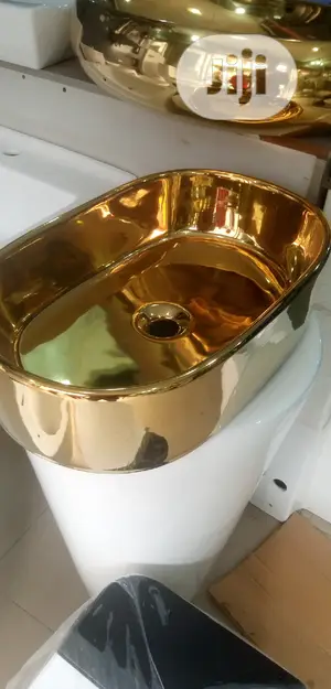 Gold Marble Top Basins.
