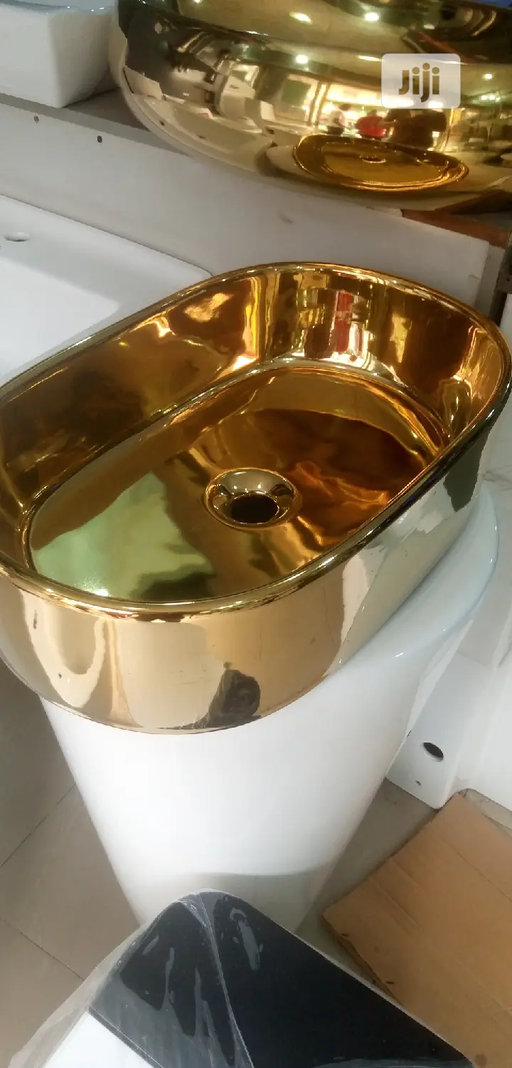 Gold Marble Top Basins.