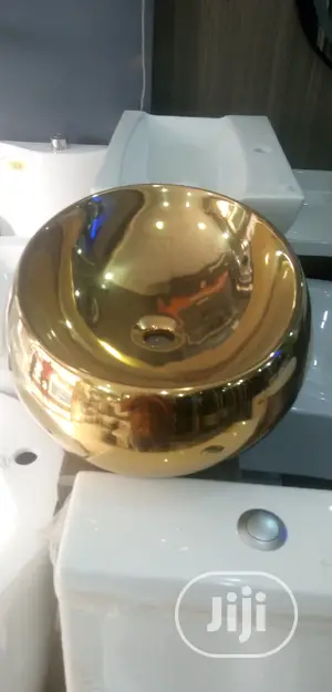 Gold Marble Top Basins.