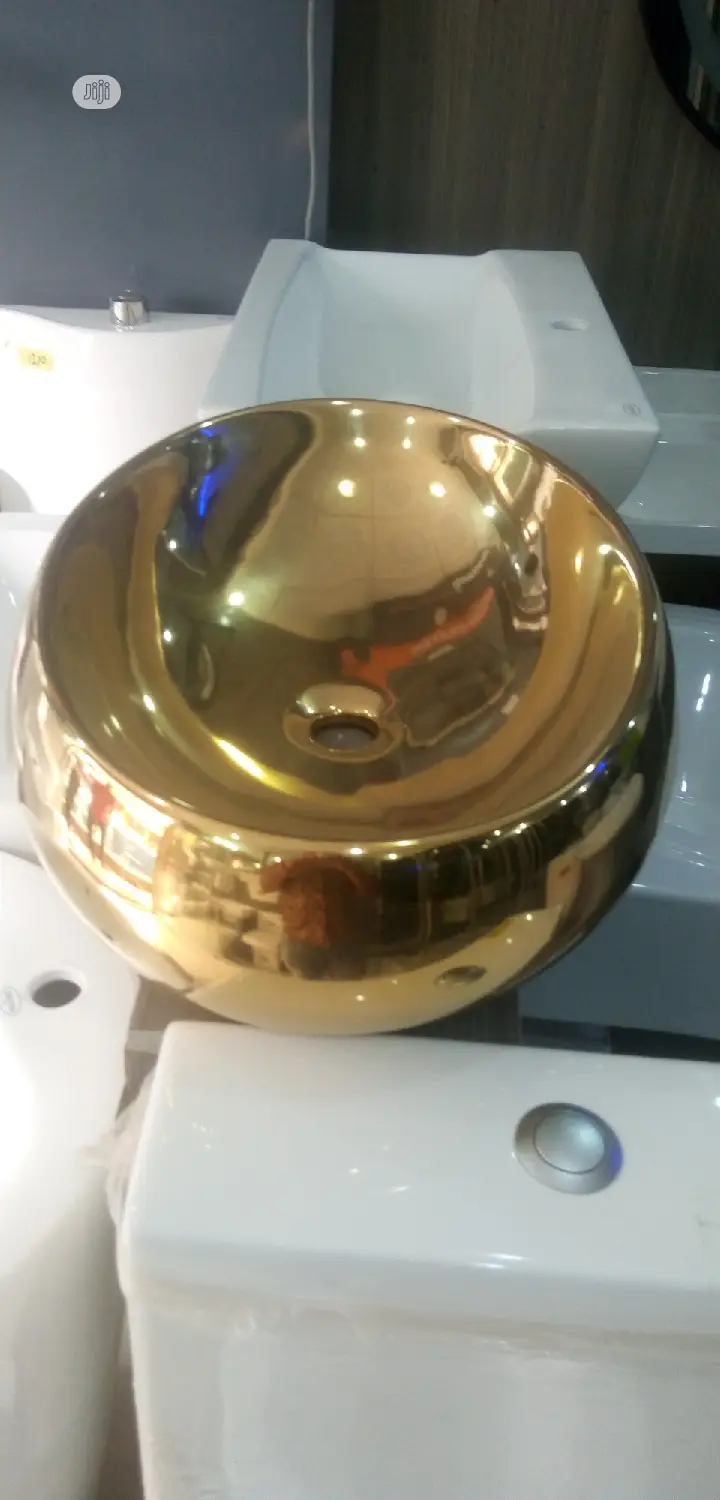 Gold Marble Top Basins.