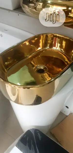 Gold Marble Top Basins.